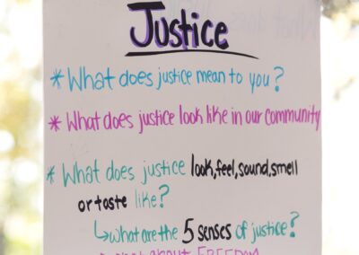 A poster asking questions about justice